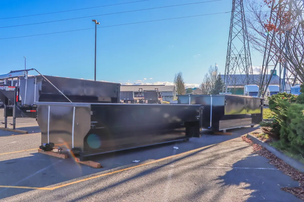 Roll-off dumpster ready for waste disposal at job site for Concrete Dumpster Rental in Middletown